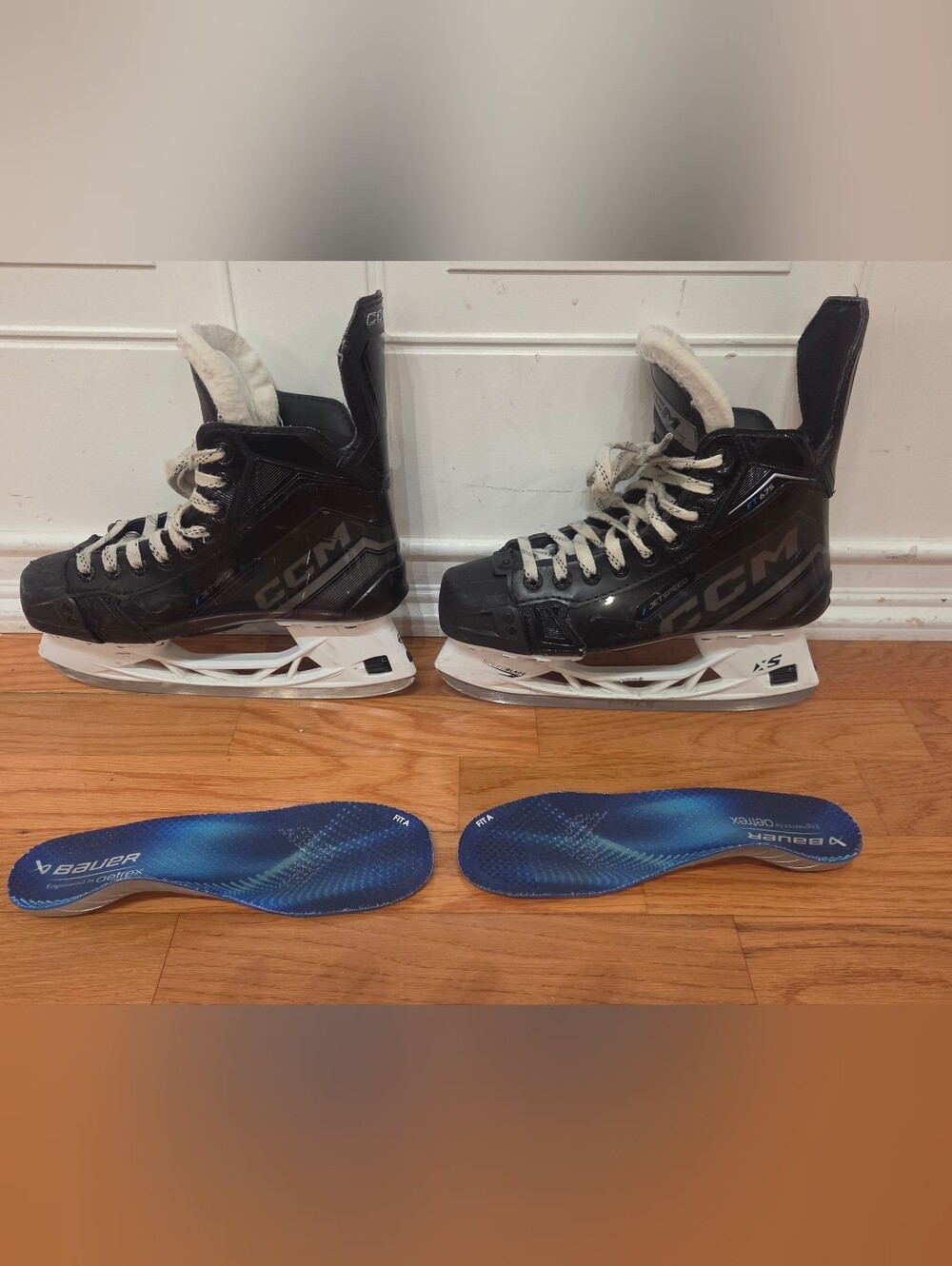 CCM Black and White Men's Hockey Skates with Blue Insoles